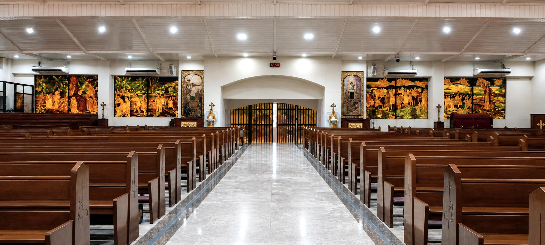 Centered aisle view inside Cathedral-Shrine and Parish of the Good Shepherd