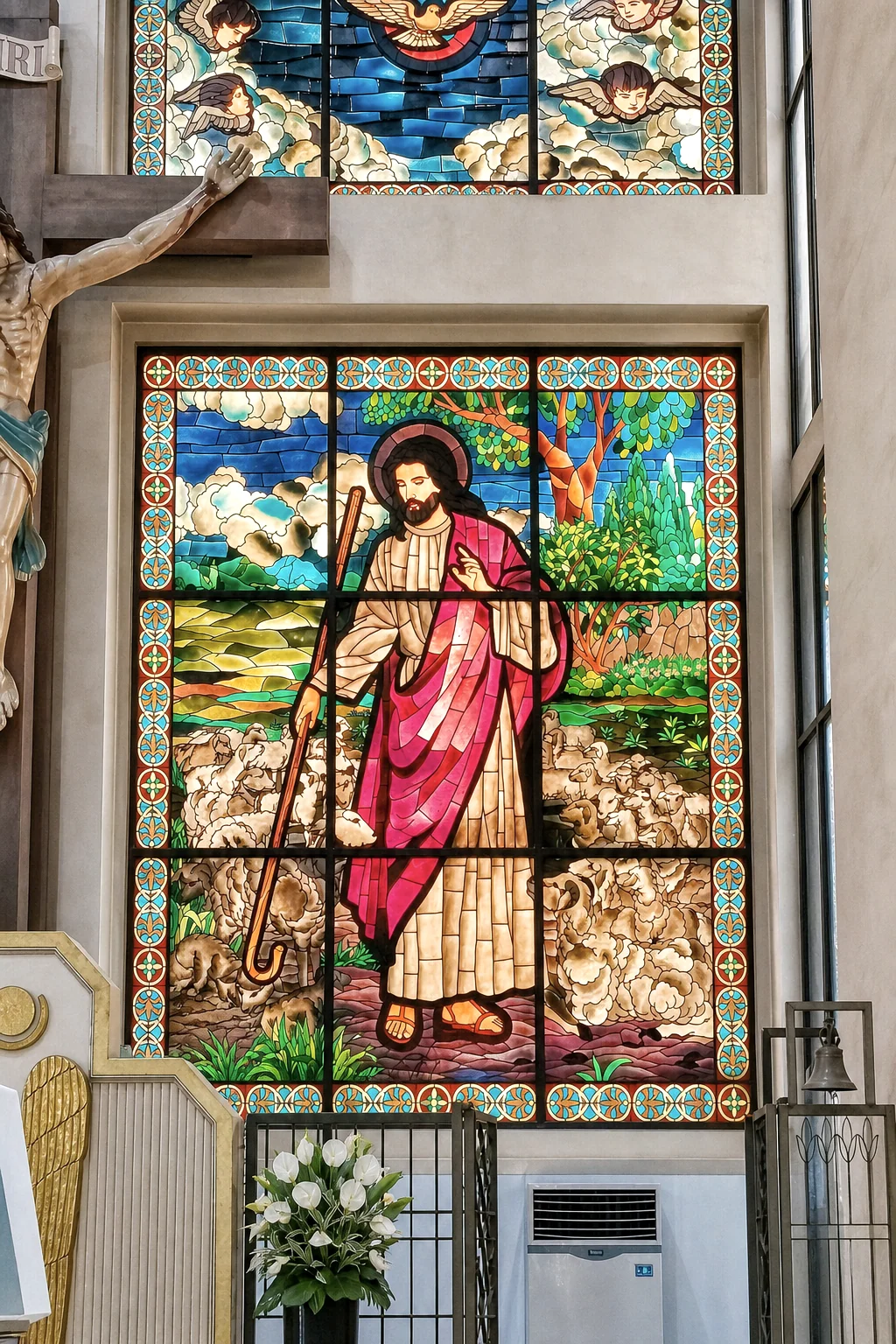 Good Shepherd stained glass detail near the altar