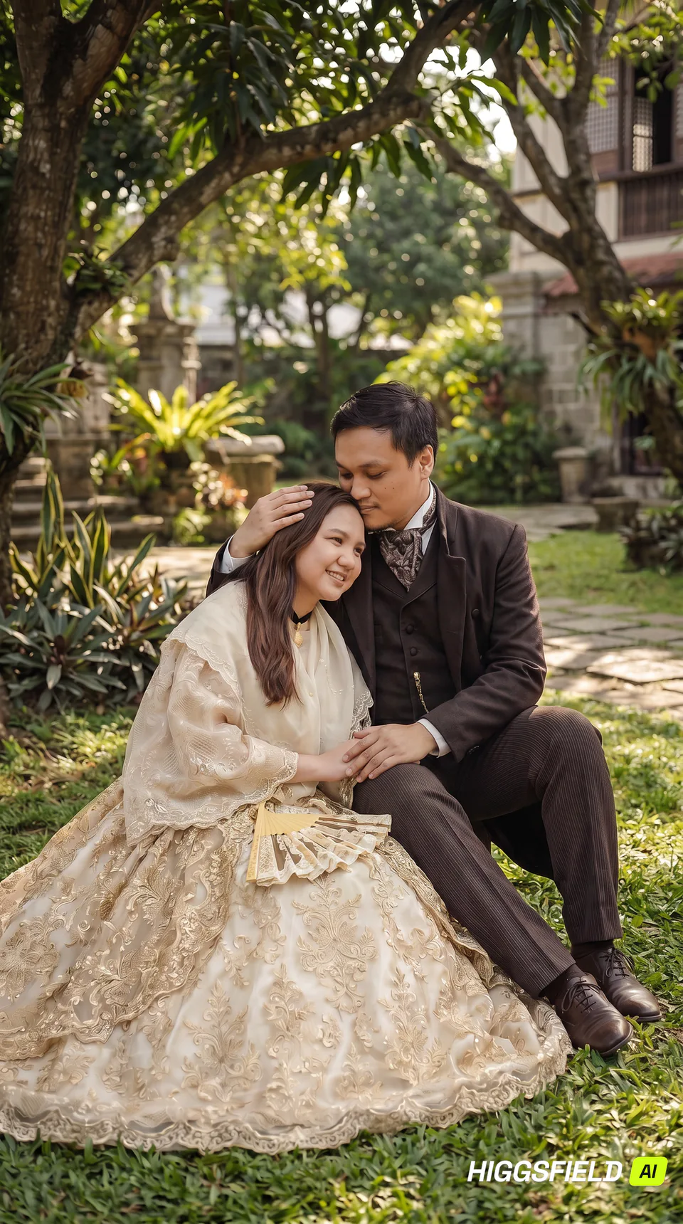 Carlo kissing Maila's forehead as they sit in a garden
