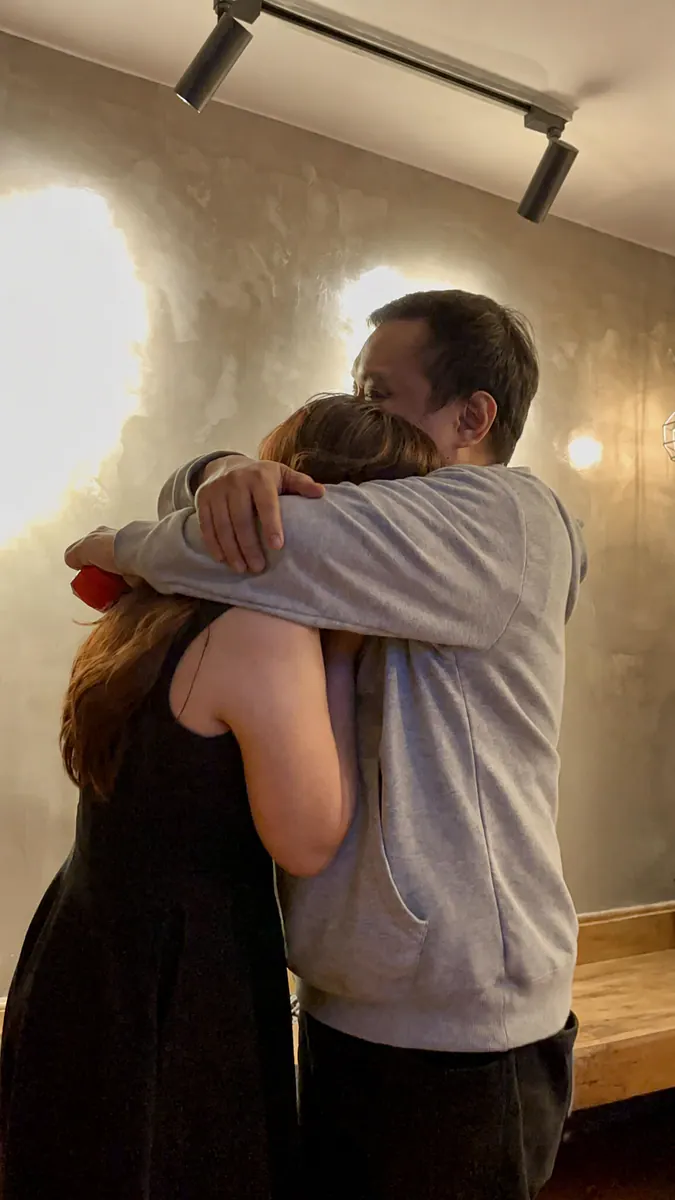 Carlo and Maila embracing after the proposal