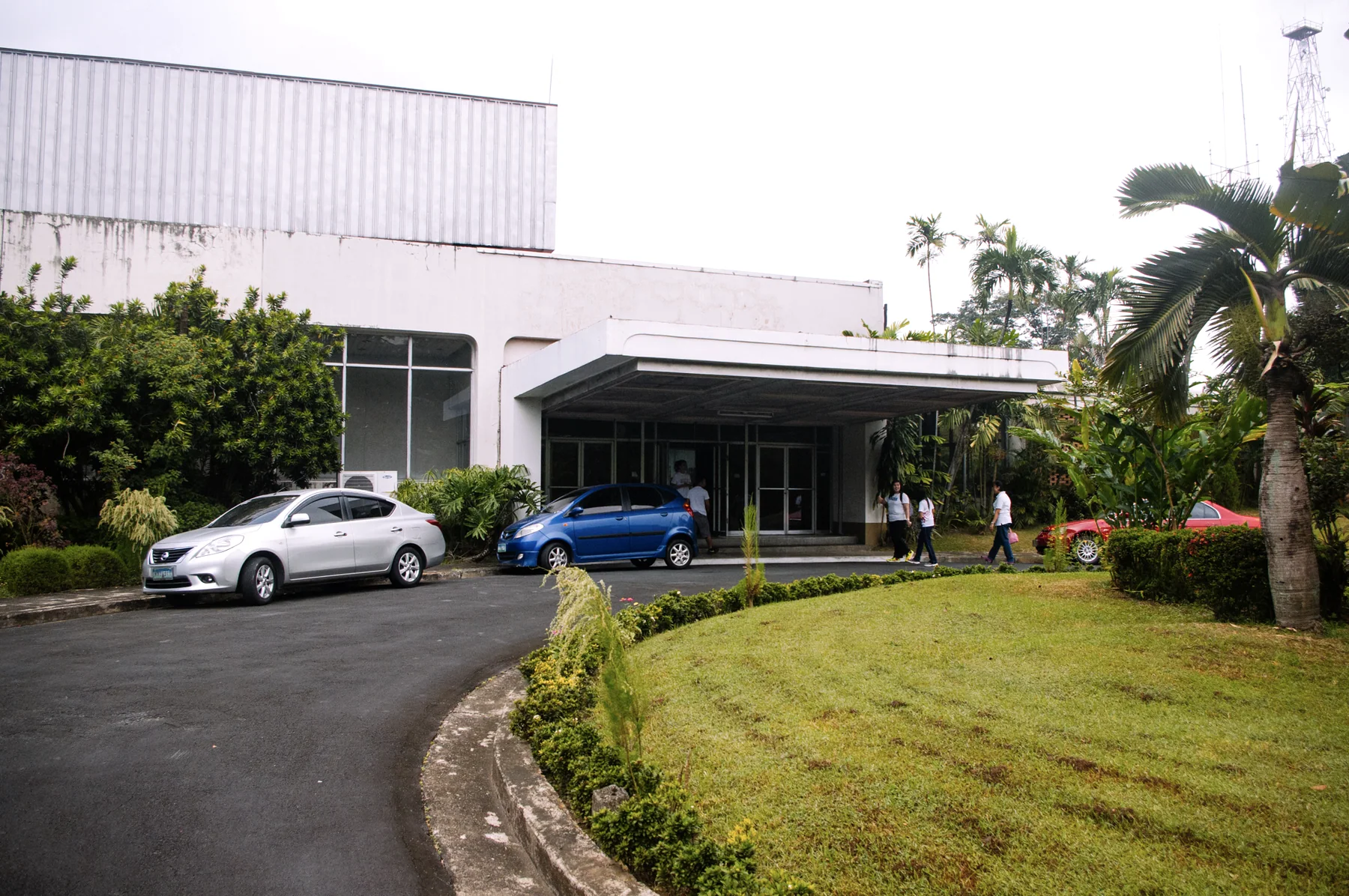 Radio Veritas Asia Function Hall entrance and garden driveway